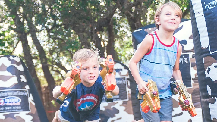Nerf Laser tag rental in the backyard for a laser tag birthday party. Our mobile laser tag equipment rental packages are great for team builders, birthdays, school events & more.