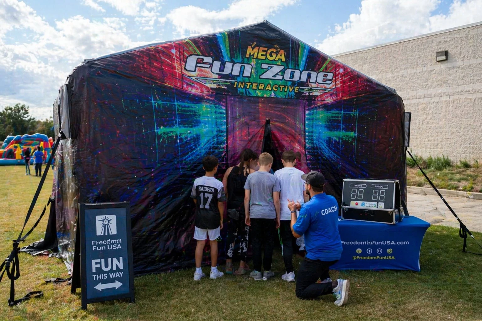 Interactive play system rental at a school or community event.