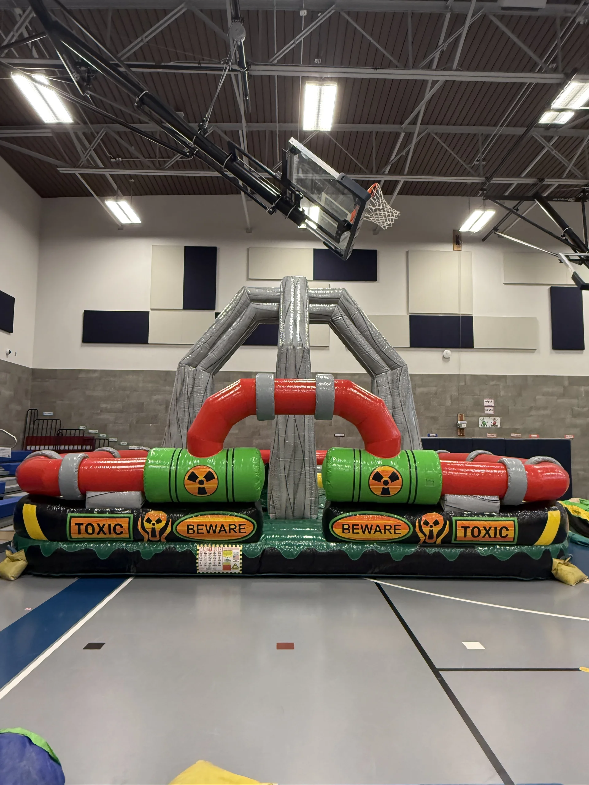 Giant inflatable wrecking ball rental at a school or community event.