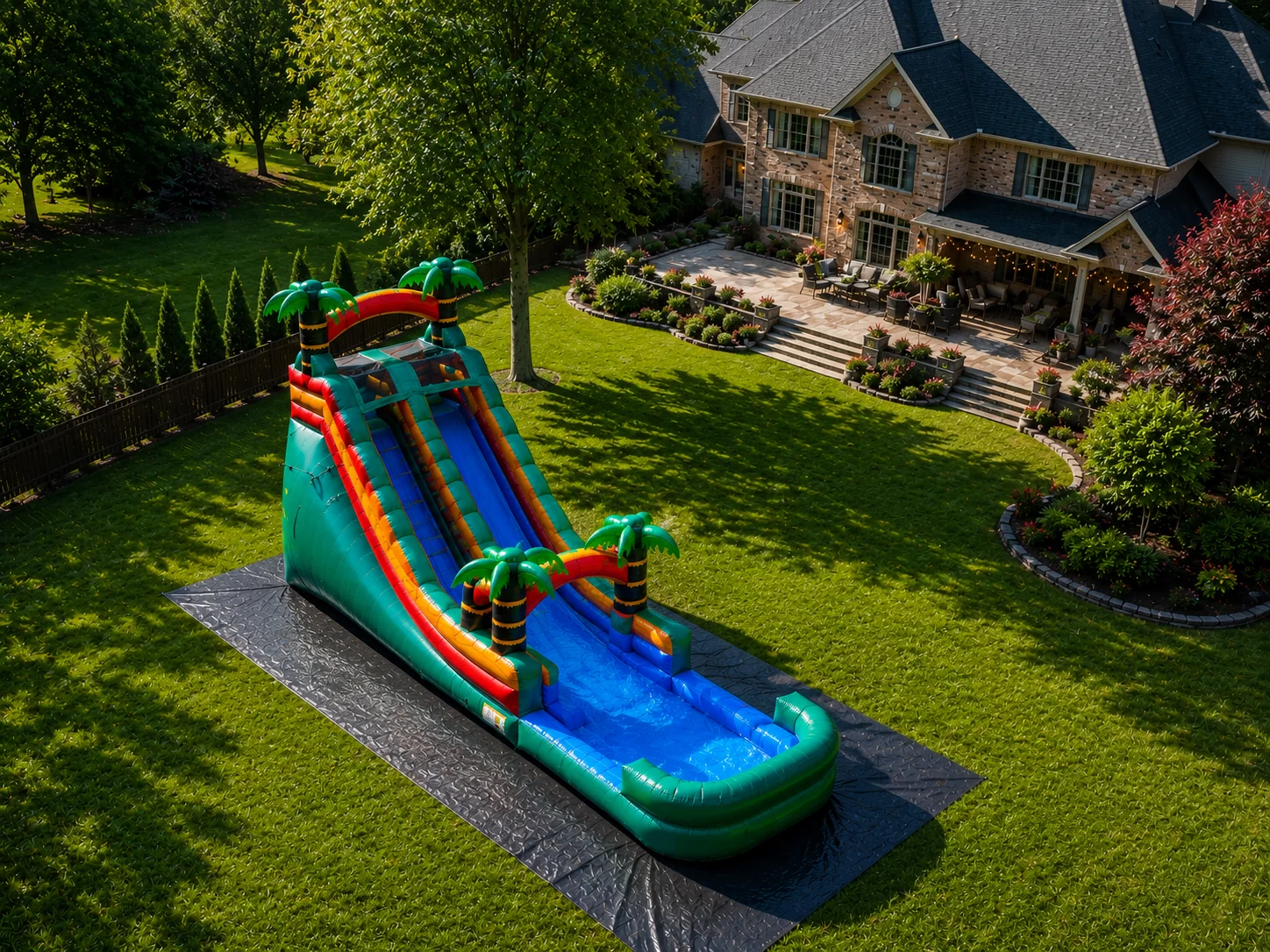 Aerial view of 18 ft Paradise Falls tropical waterslide rental in Winston-Salem NC