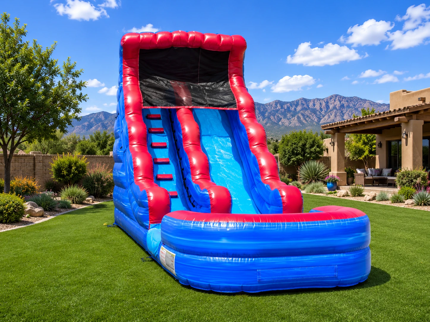 Front view of the Freedom Fun Liberty Wave 18' waterslide rental with splash pool in Albuquerque NM