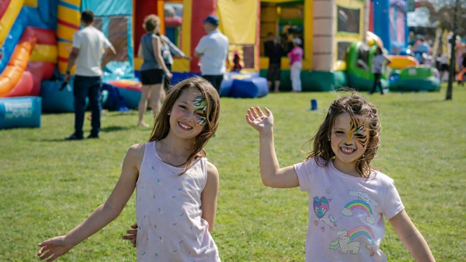 Kids and families celebrating together at a large Freedom Fun community event