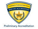 BHCOE Accredited 2022 seal with a laurel wreath and text 'Committed to Continuous Improvement' above it.