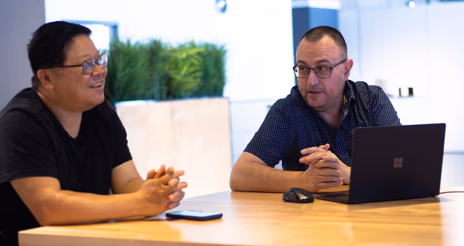 two nowpac workers during a meeting