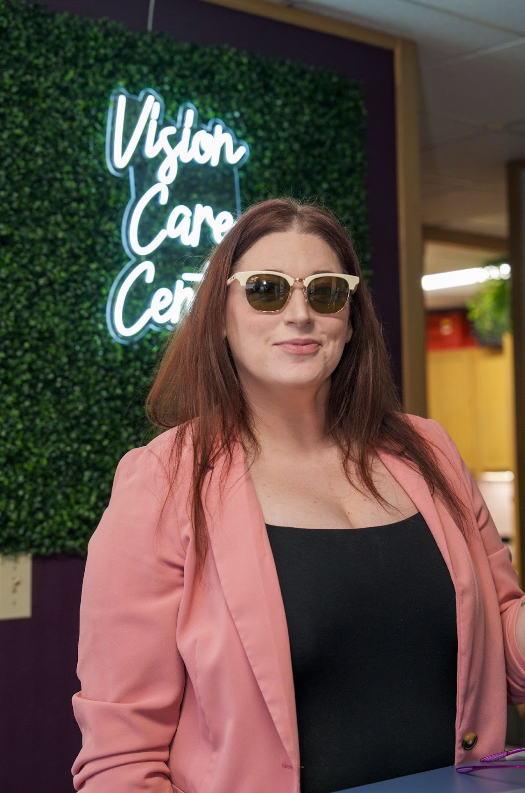 Portrait of Jackie wearing Maui Jim sunglasses