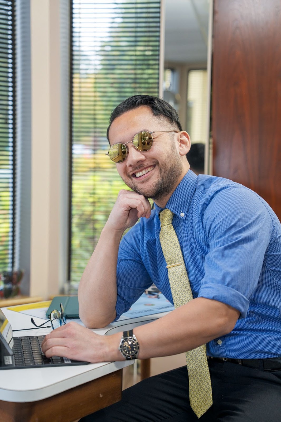 Portrait of Dr. Jin wearing Maui Jim sunglasses