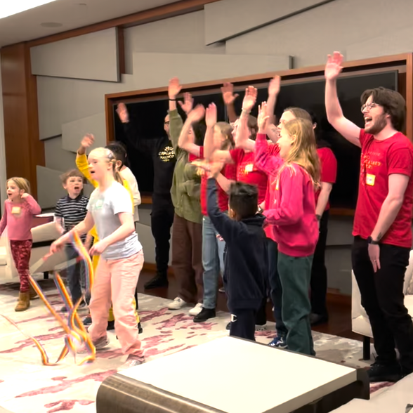 Watch Chickenshed NYC Players perform at a community event