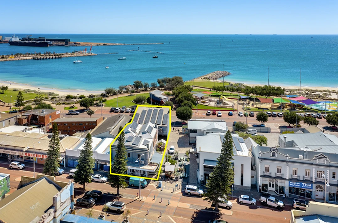Aerial view of the property and coastal foreshore