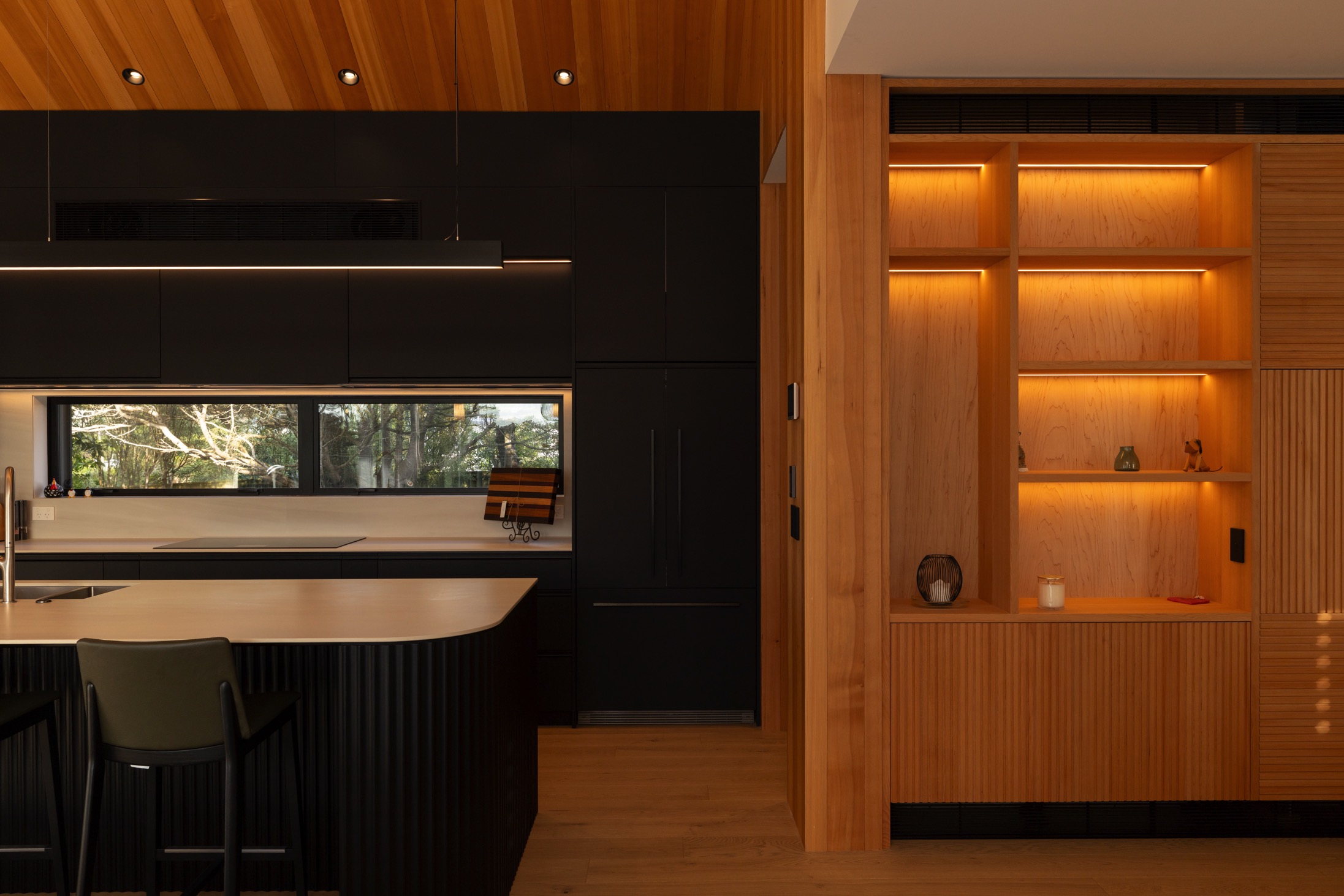 Modern kitchen with modern LED strip lighting installed in cabinetry