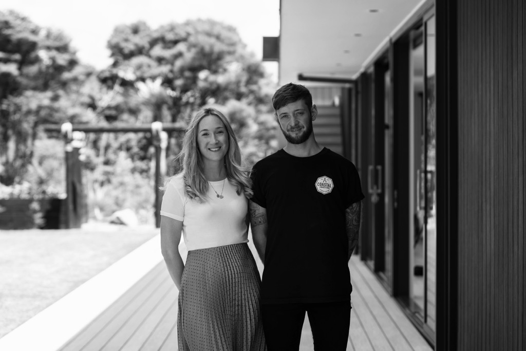 Joe Kelly and Kimberly Kelly standing in front of the completed Waipu project
