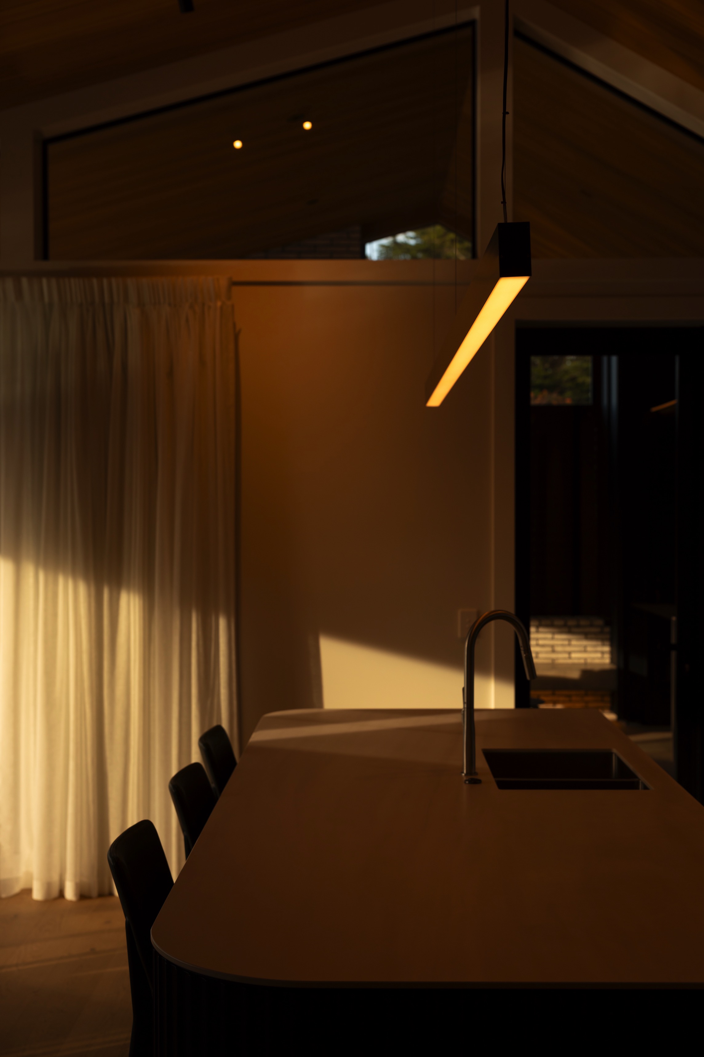 LInear LED Pendant above kitchen island