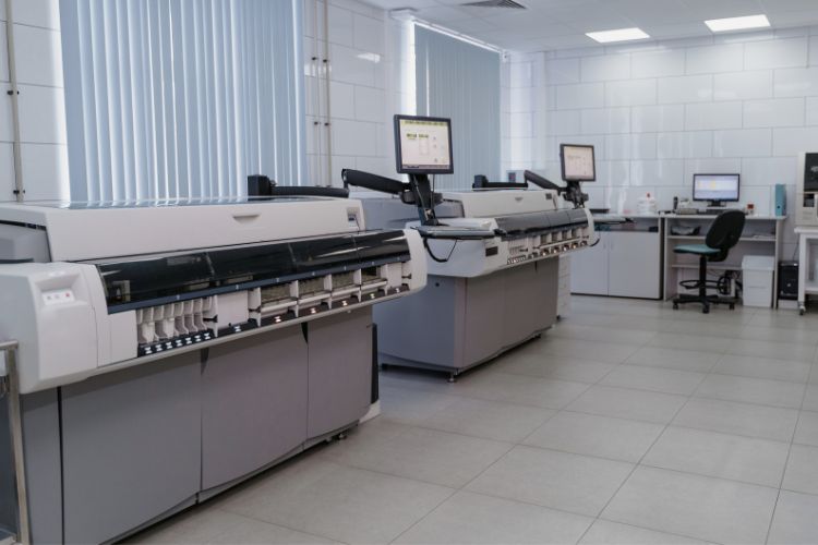 2 large analytical instruments in a laboratory used on a blog about equipment finance for business