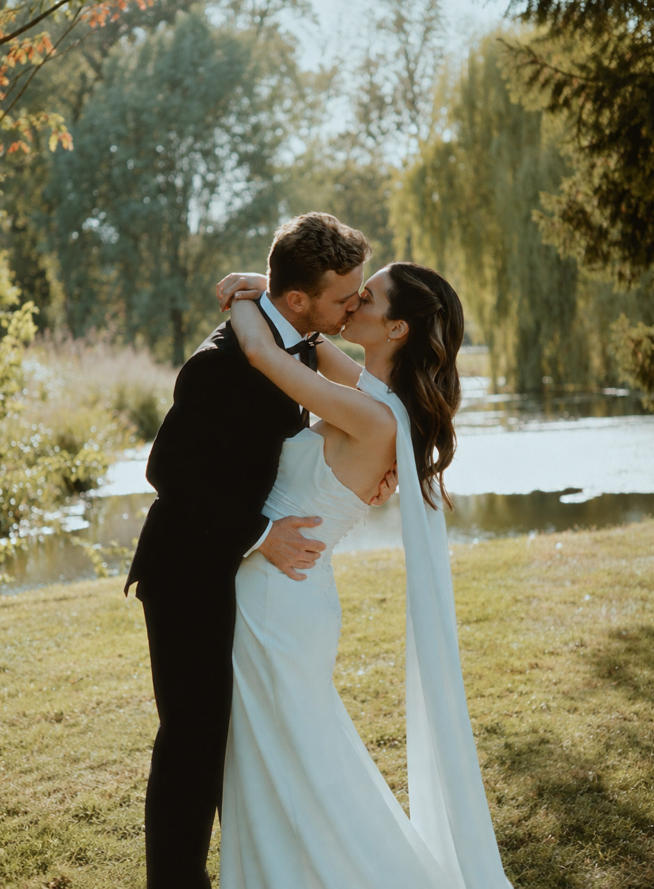 bride and groom share a moment after the ceremony