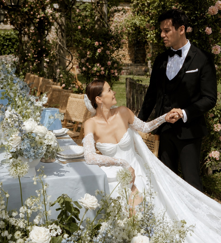 bride and groom sat at dinner table