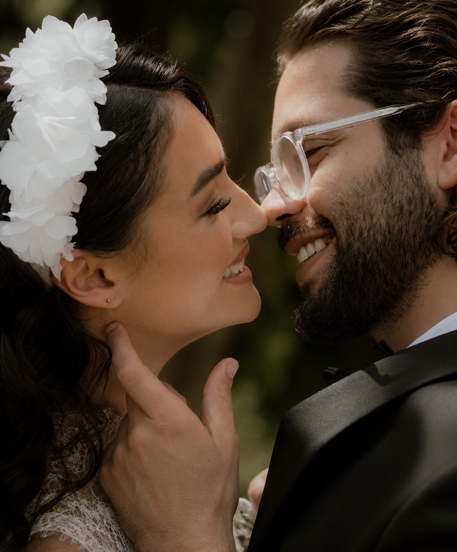 bride and groom share a kiss