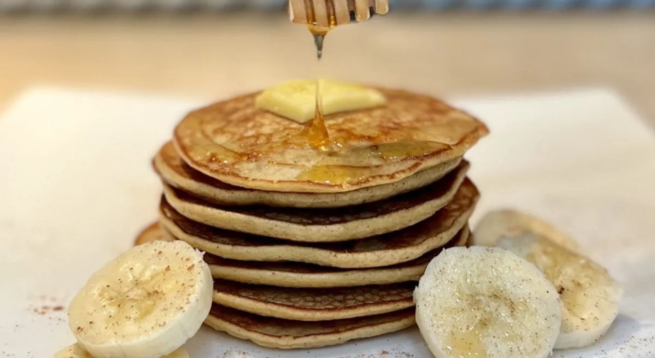 Stack of pancakes with some banana slices