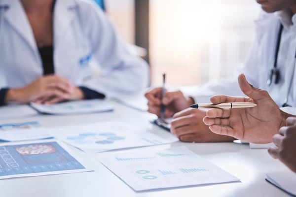 Doctors reviewing information and guidelines