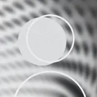 Close-up of translucent bubbles with a patterned black and white background.