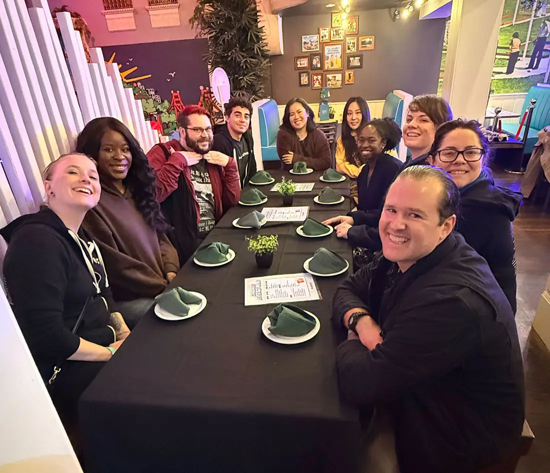 Material team enjoying a group dinner during Hack Week.