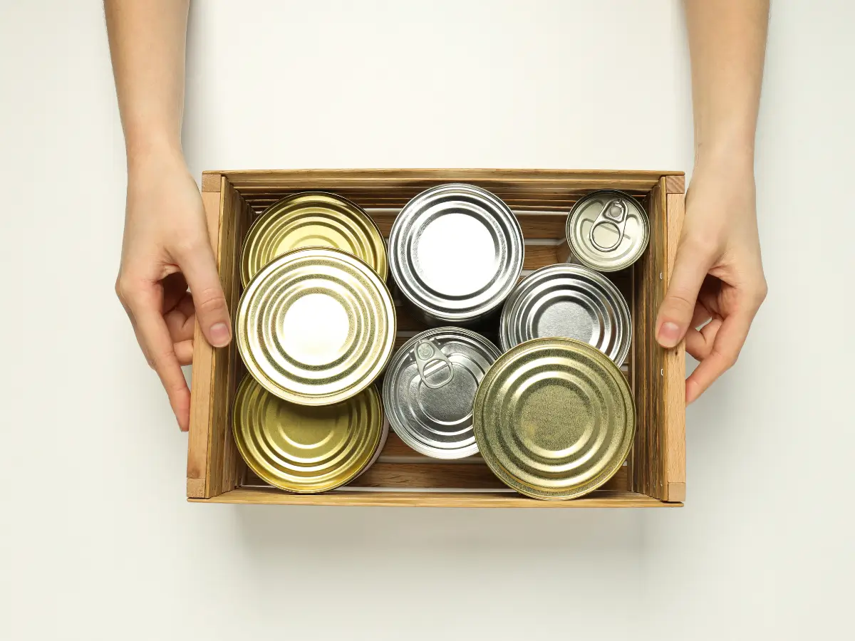 Collection of tin cans in a box