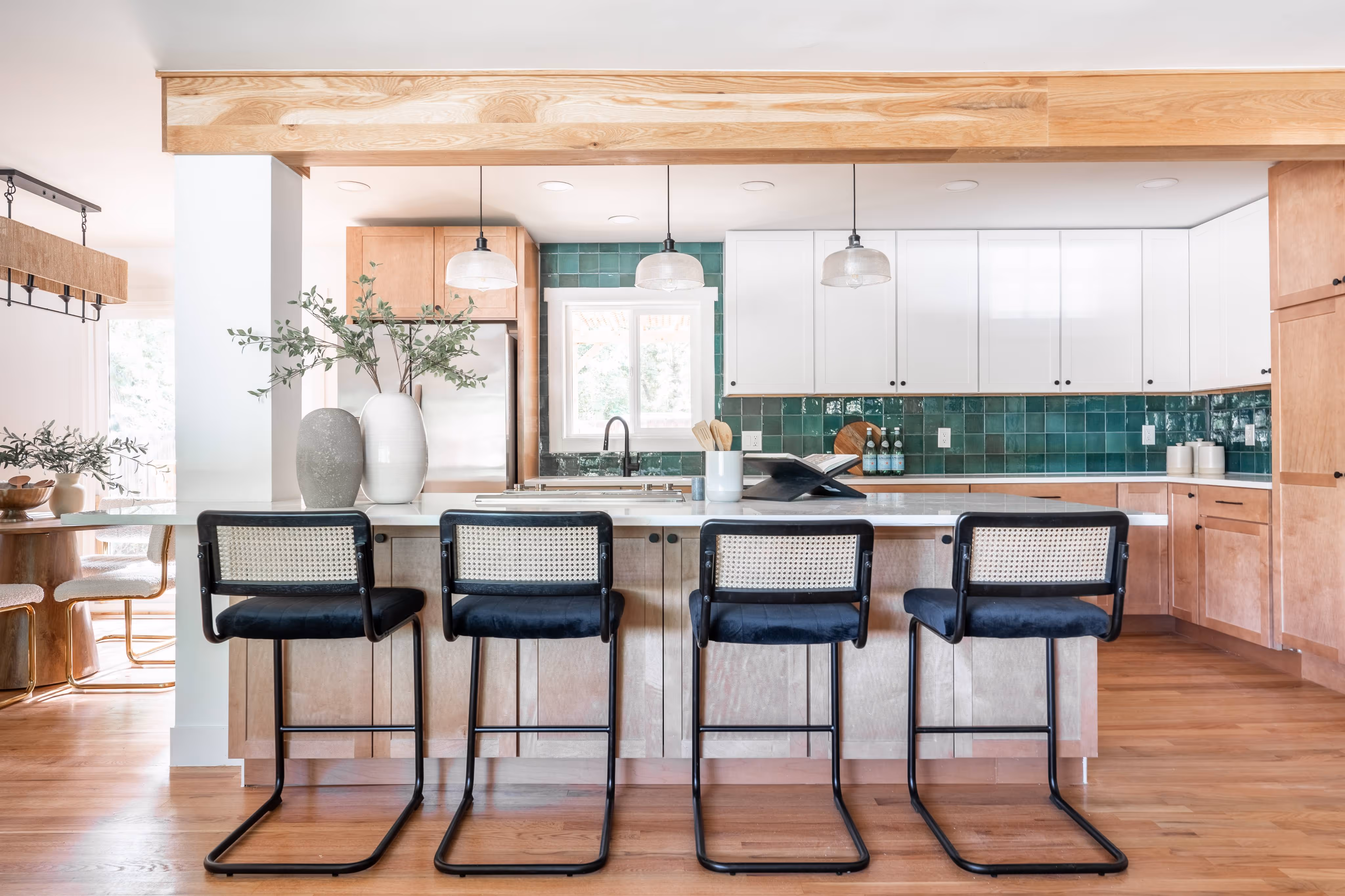 Photo of a freshly remodeled kitchen with updated furnishings and finishes.