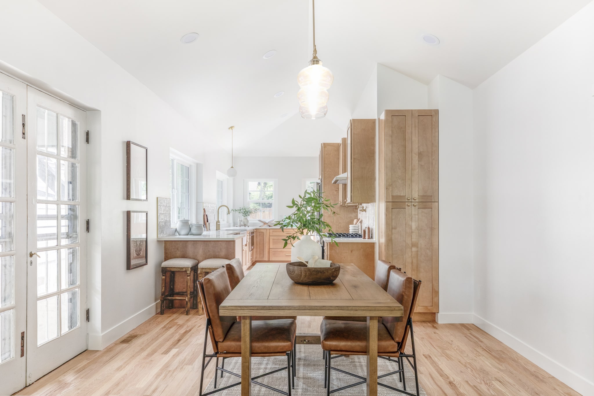 Photo of a freshly remodeled kitchen with updated furnishings and finishes.