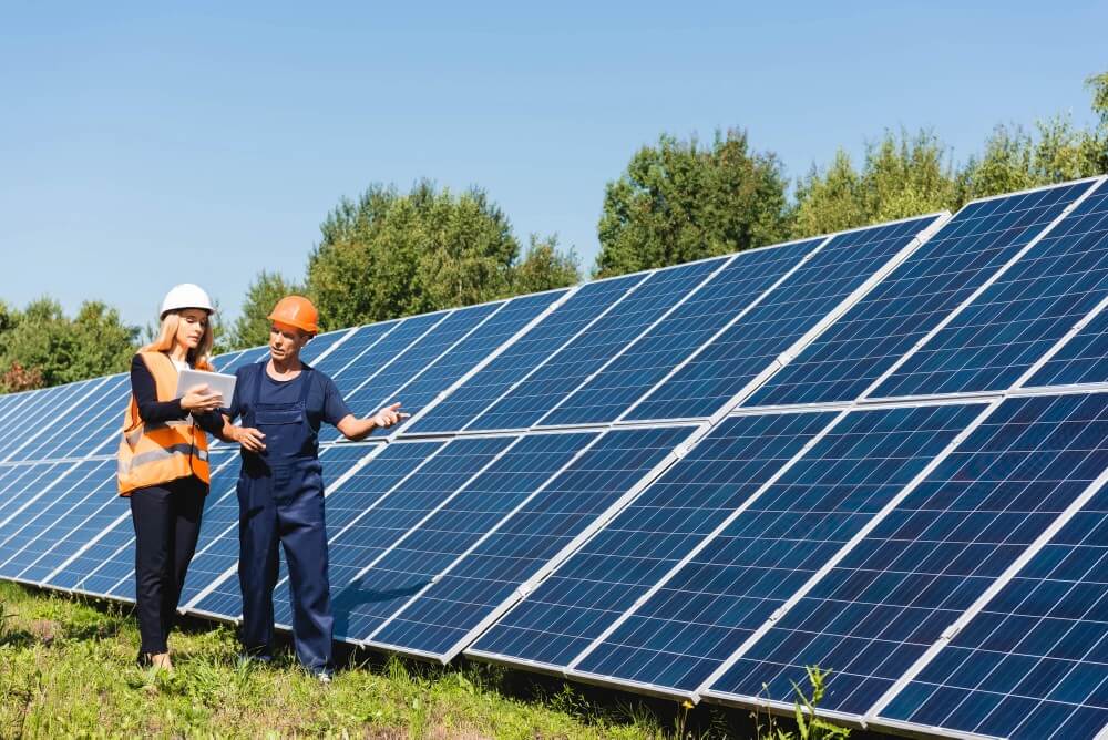 A power and renewable energy photo collage featuring solar panels, windmills, and nature shots. 