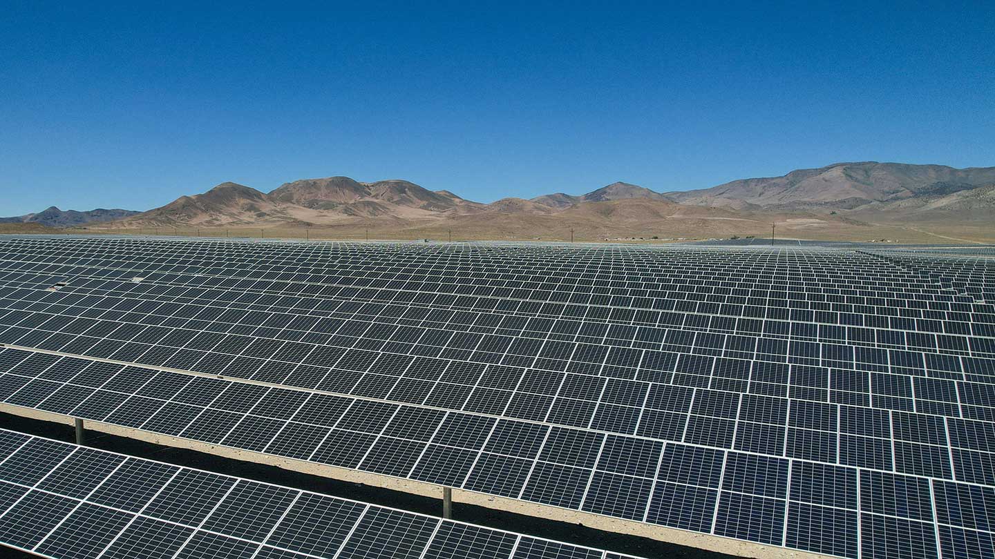 A power and renewable energy photo collage featuring solar panels, windmills, and nature shots. 