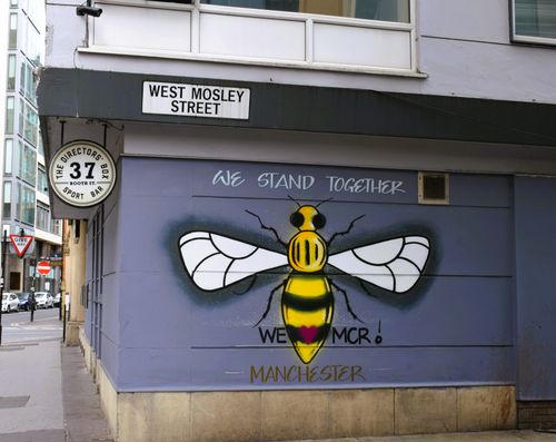 "We stand together, We love Manchester"