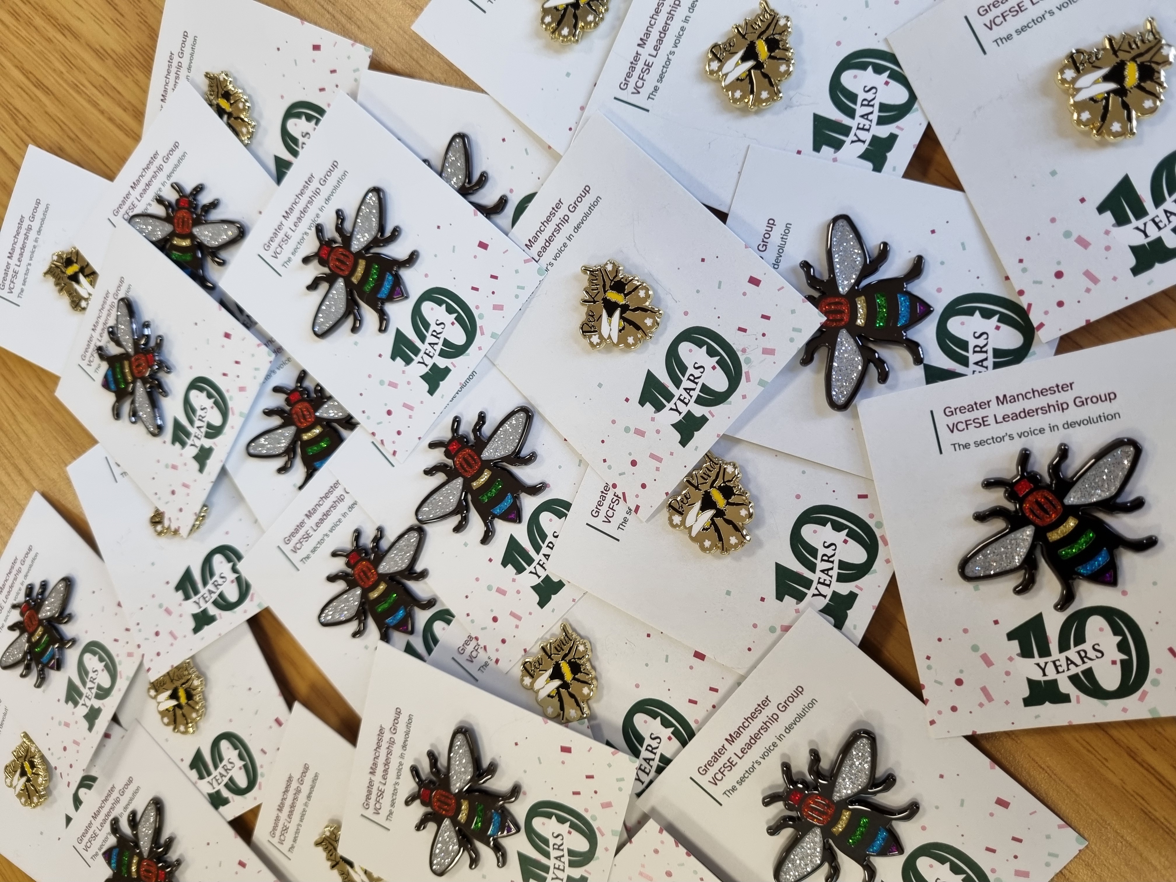 Badges to celebrate 10 years of the GM VCFSE Leadership Group