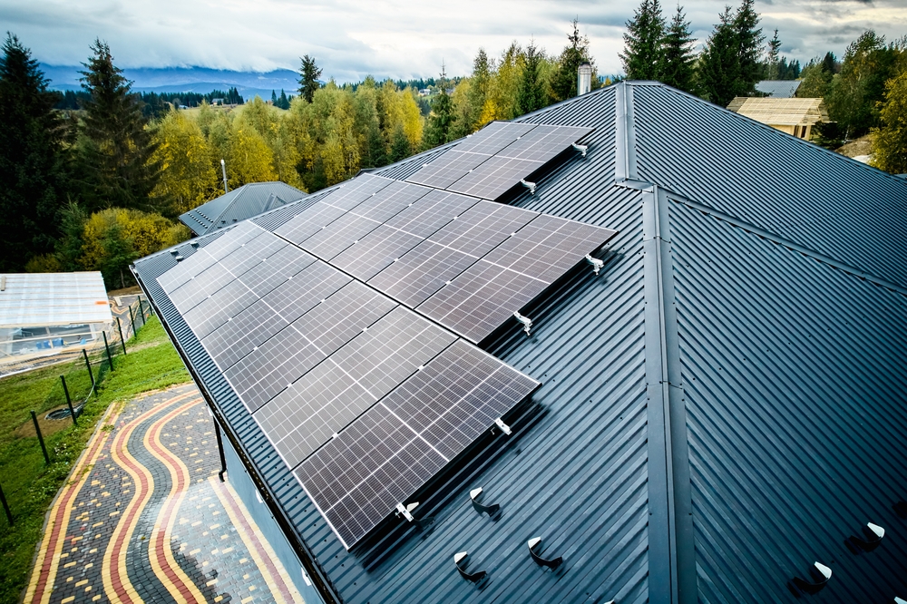 Solar panels on a small, modern building