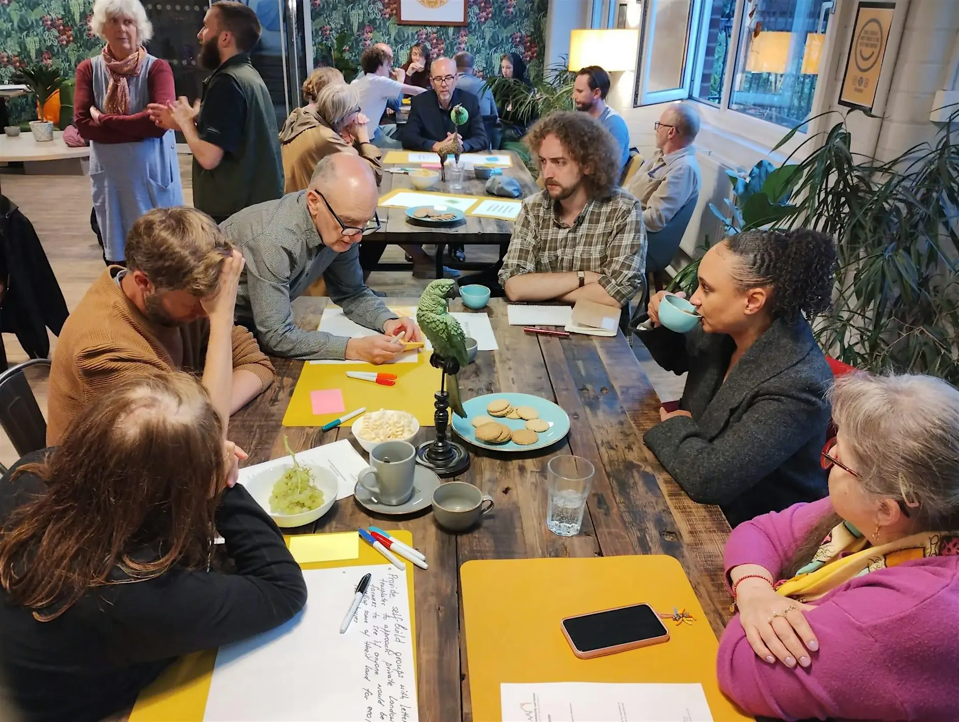 People around a table in discussion