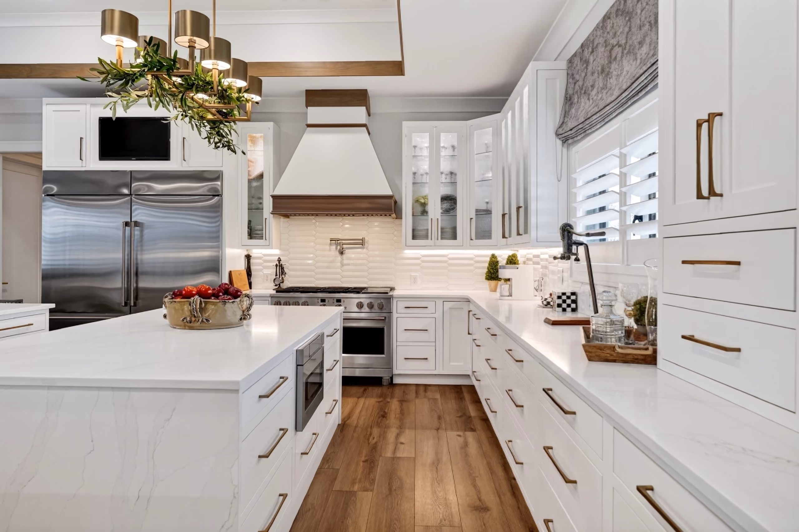Luxury custom home with an outdoor patio and scenic landscaping, showcasing the RS Signature Homes building process.