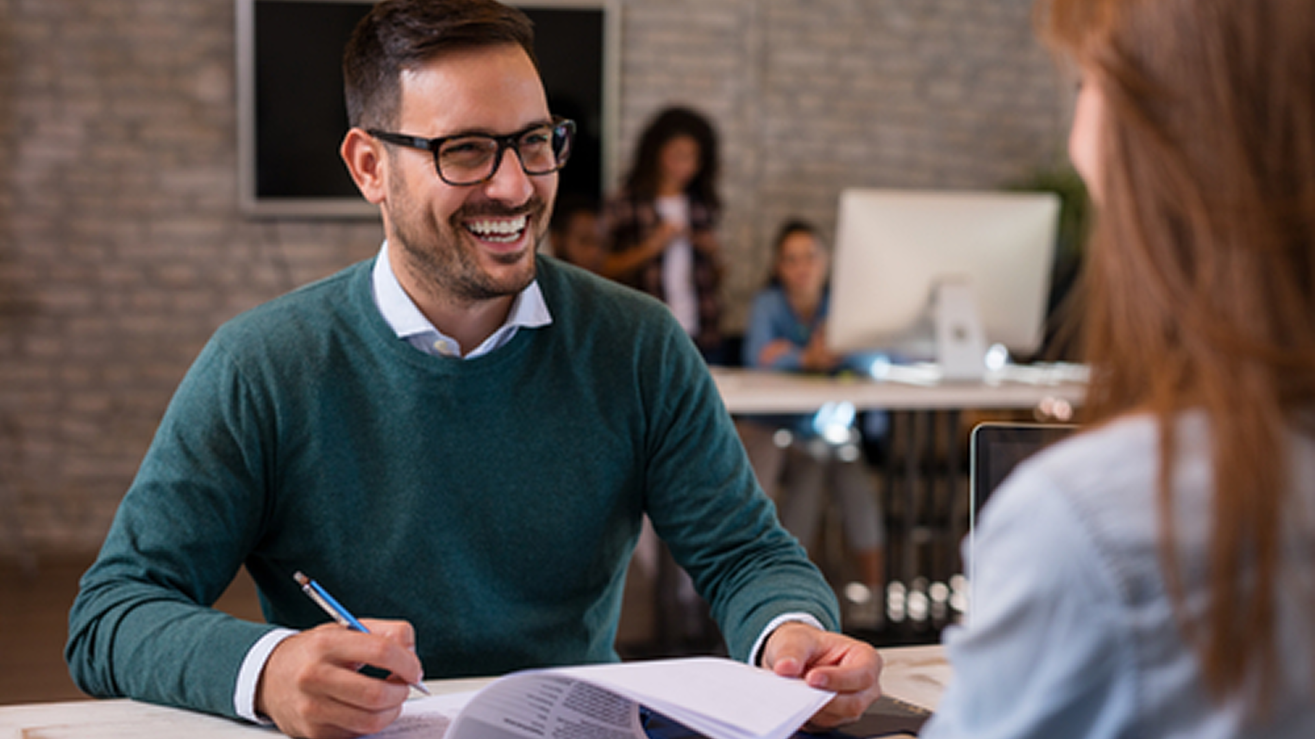 Advisor reviewing factoring options with a client
