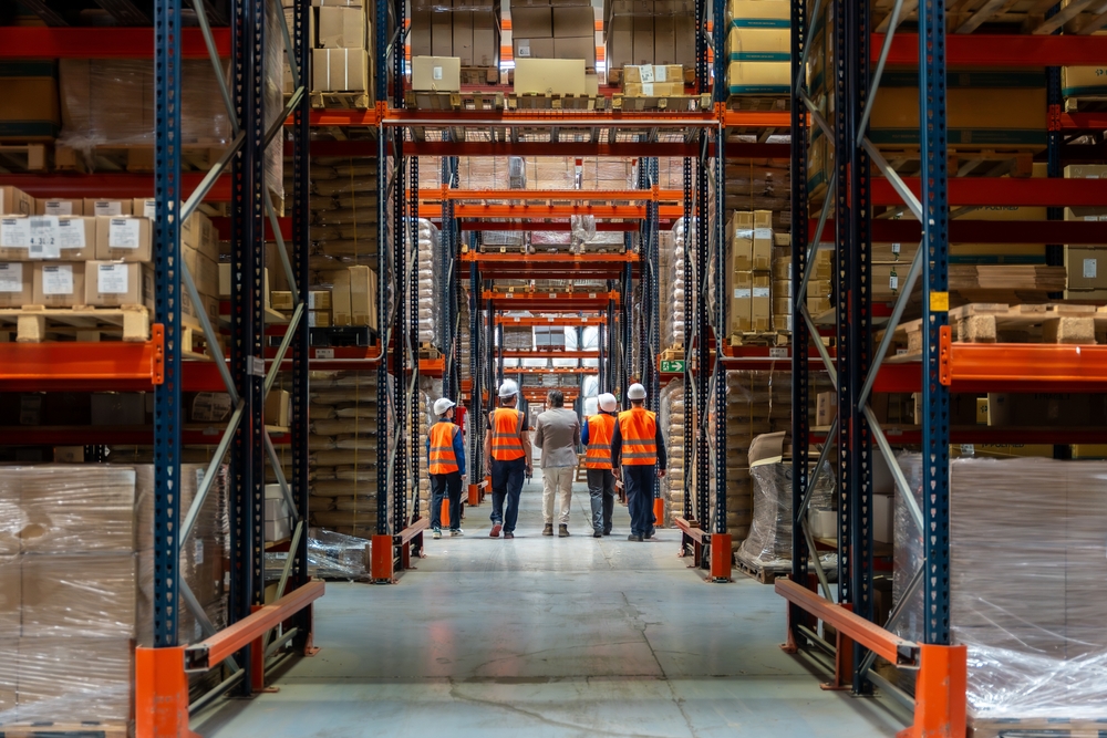 Warehouse worker managing distribution inventory