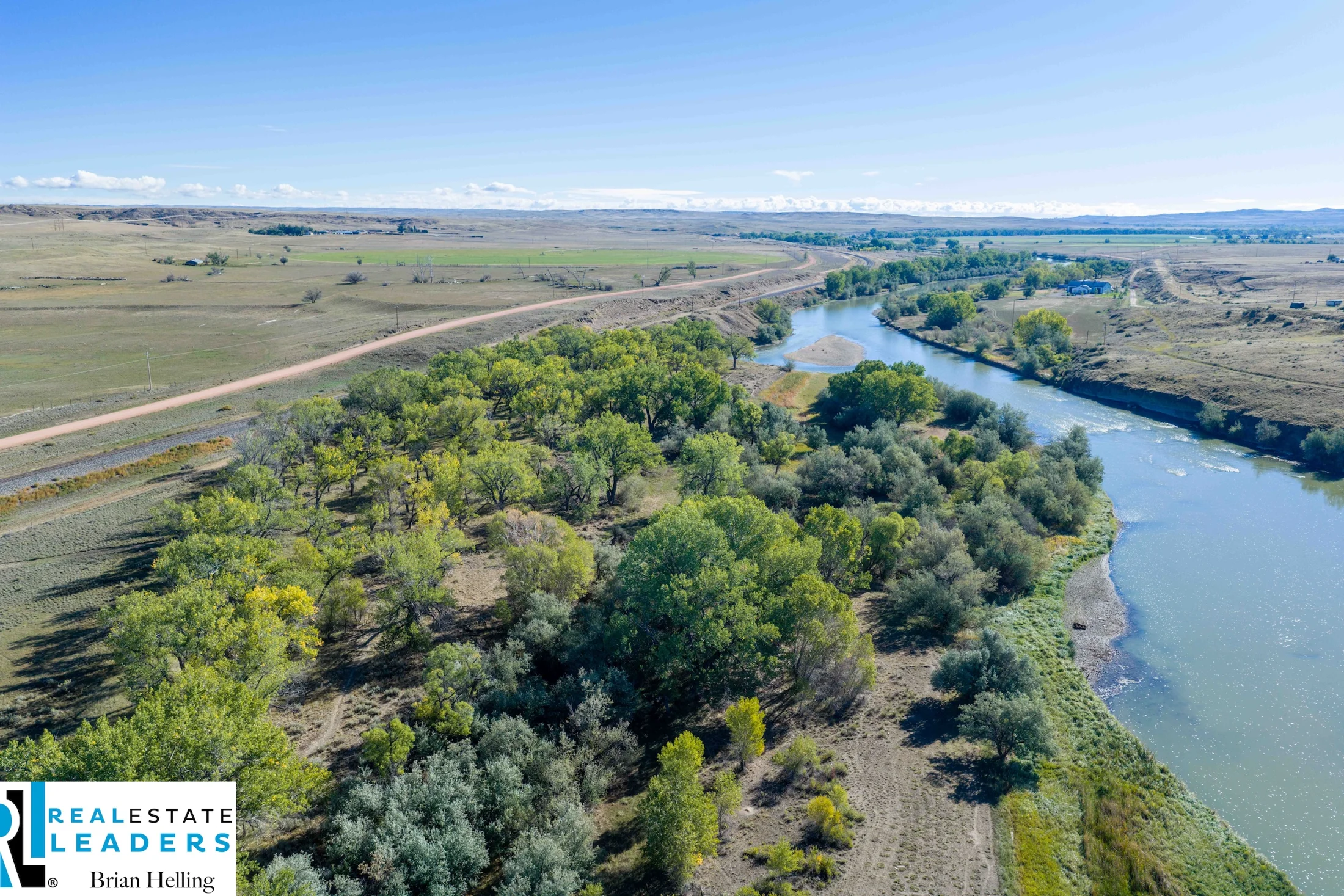 A sweep of river, trees and open country