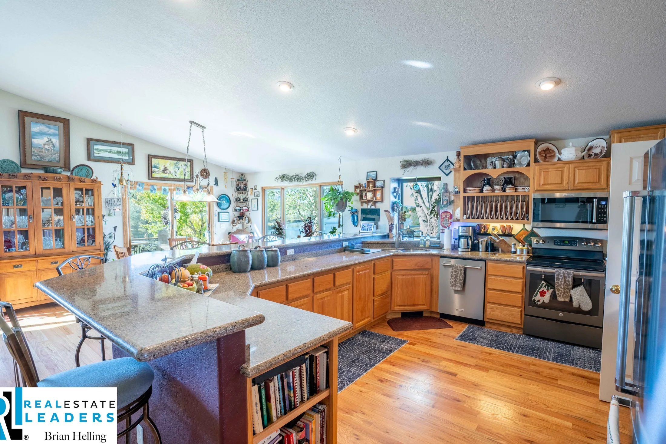 Kitchen with an island and warm wood cabinetry