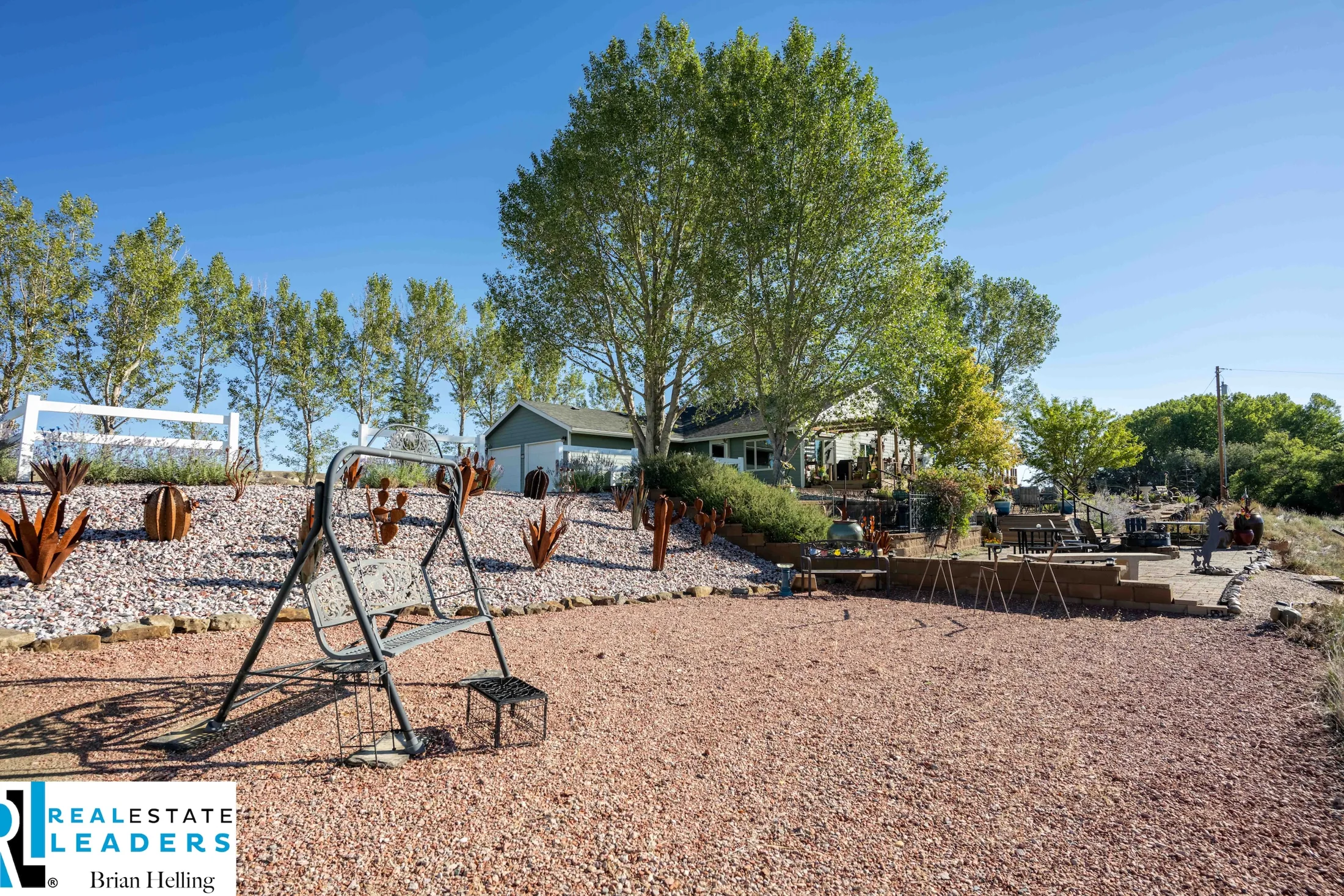 Outdoor seating and garden space beside the home