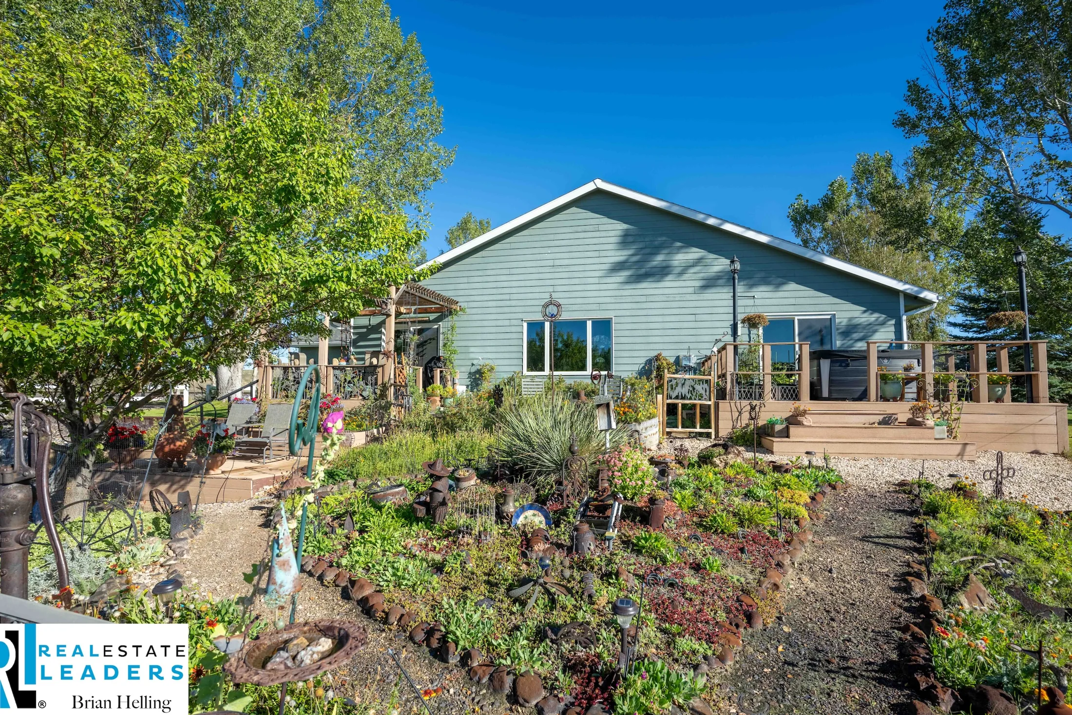 The riverside deck and landscaped garden