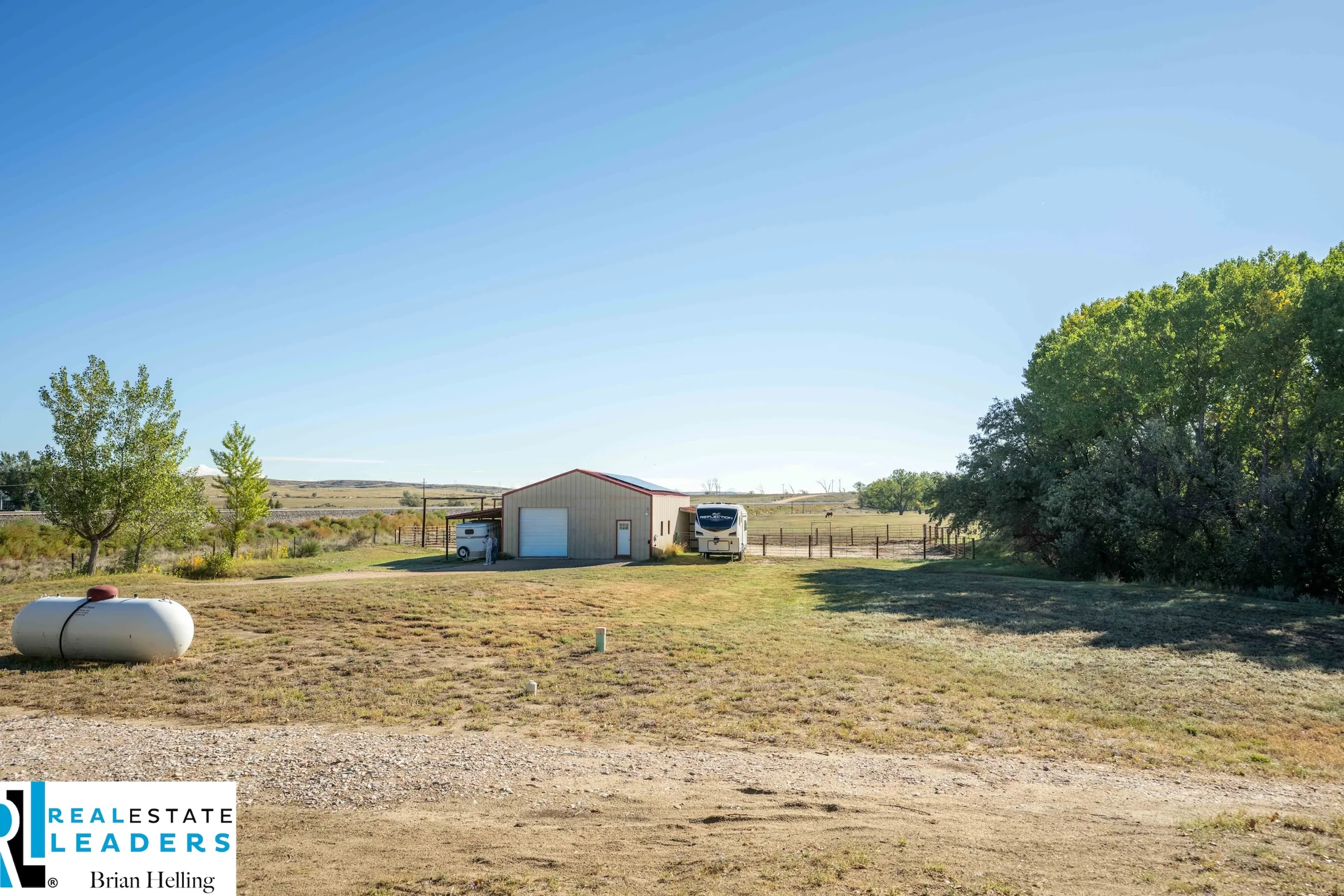 Open ground and a detached outbuilding