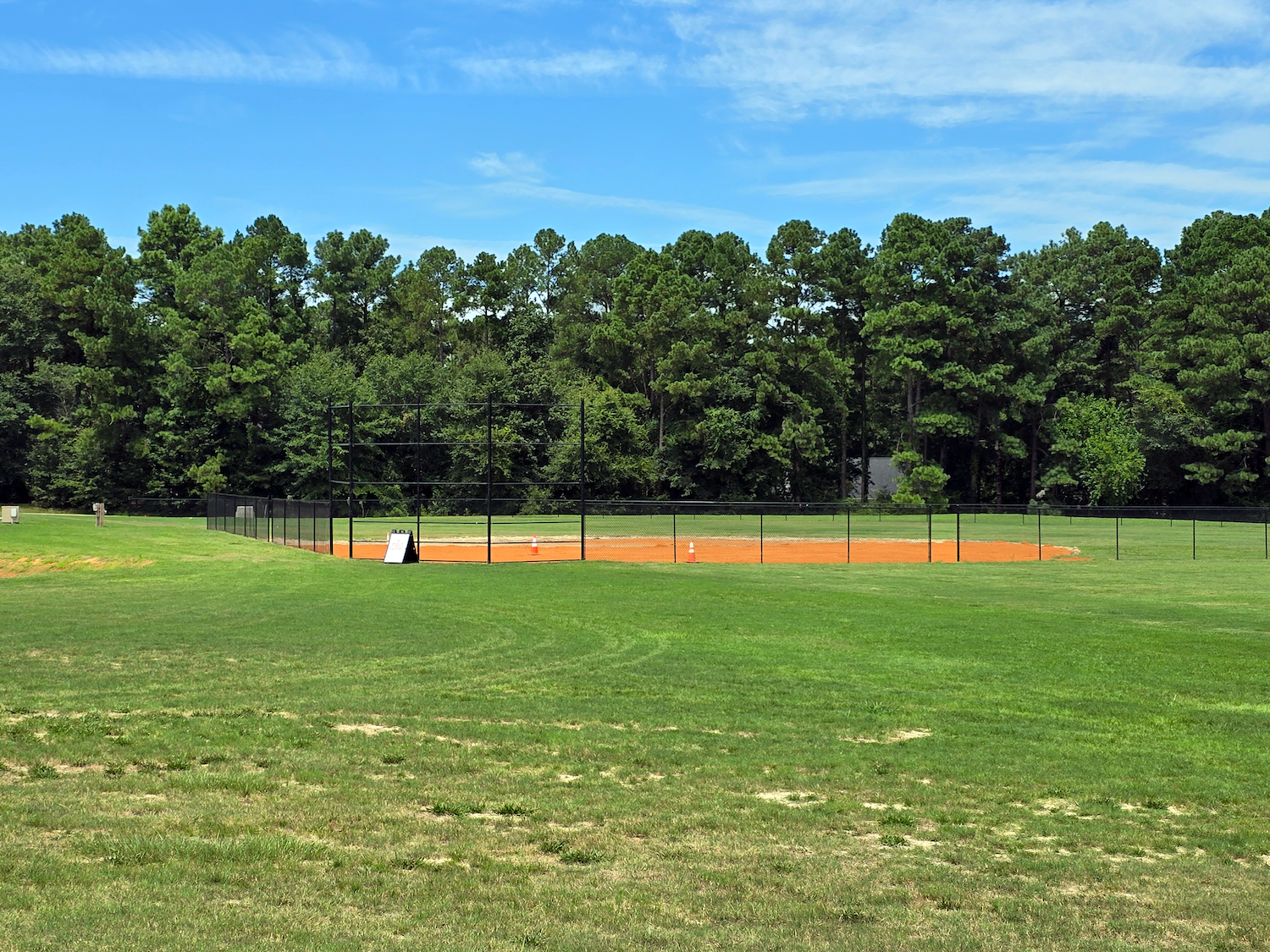 Baseball and multipurpose field at Hardee Lane Park in Whispering Pines, North Carolina, designed by Longitude Planning Group as part of the park’s recreation and amenity master plan.