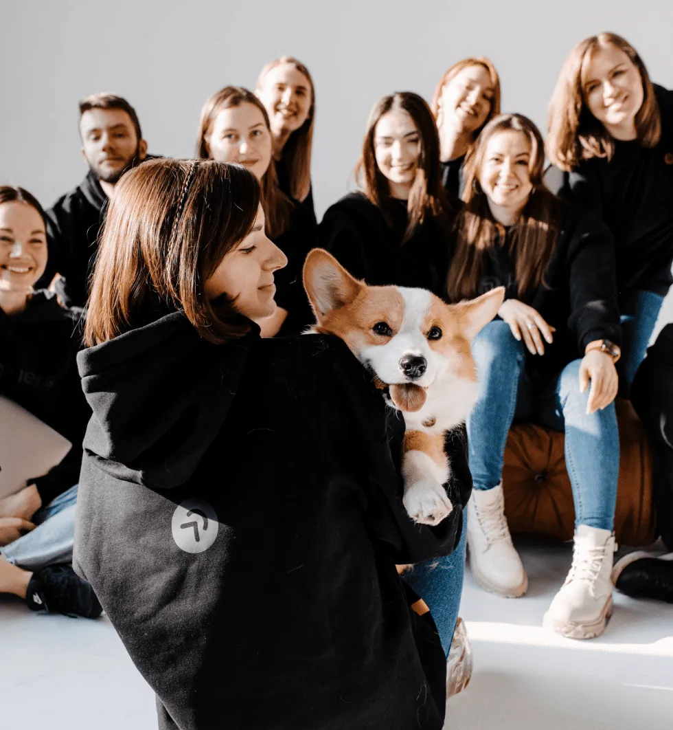 Aimers team and their mascot corgi