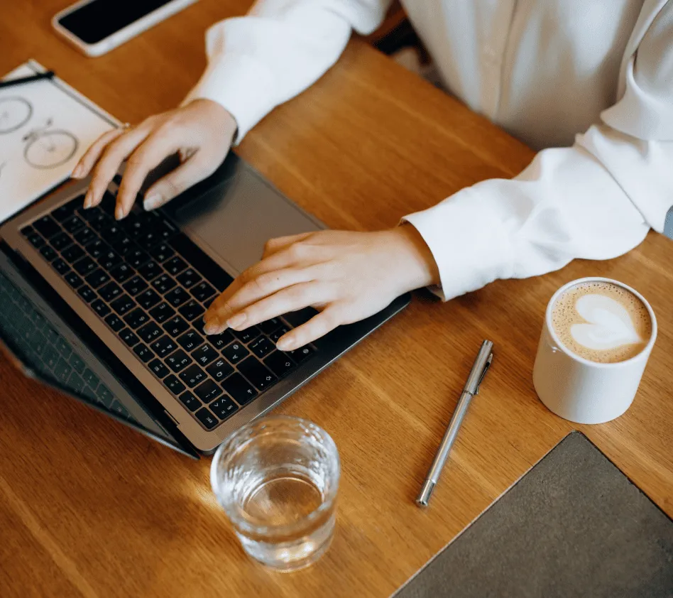 Photo of the laptop and hands