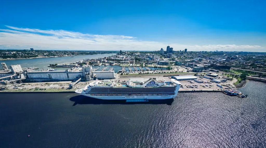 The Port of Québec is developing shore power infrastructure at Wharf 30 and Wharf 101 to enable cruise and cargo vessels to connect to the electrical grid while berthed, eliminating the need to run auxiliary engines. Supported by the Government of Québec, the project will reduce greenhouse gas emissions (nearly 70,000 tonnes at Wharf 30 and 5,600 tonnes at Wharf 101 over 10 years), improve air quality, and lower noise pollution. Expected to be operational in 2028, the initiative advances the Port’s broader maritime decarbonization strategy.