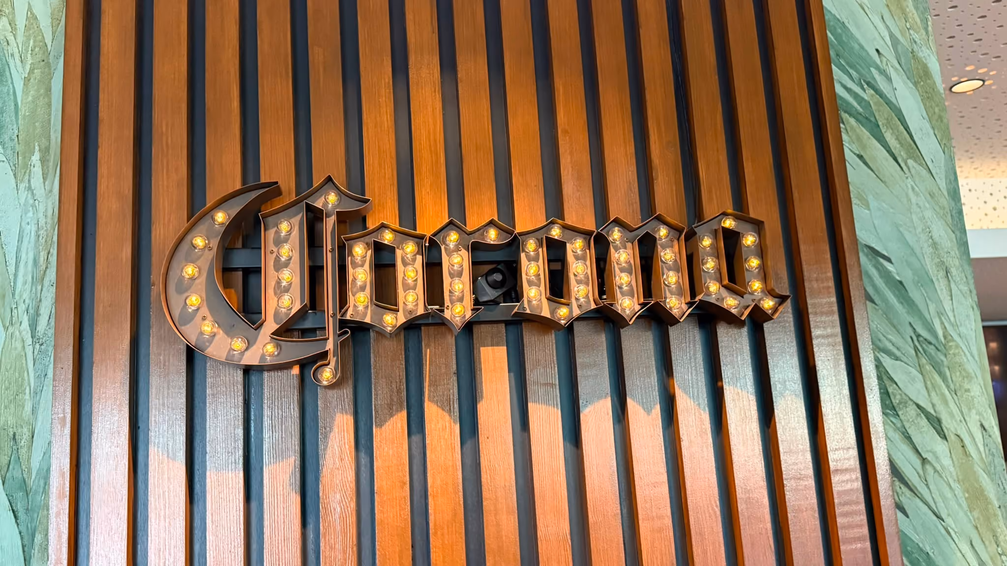 A sign of corona insidethe Velvet Lounge Bar 
