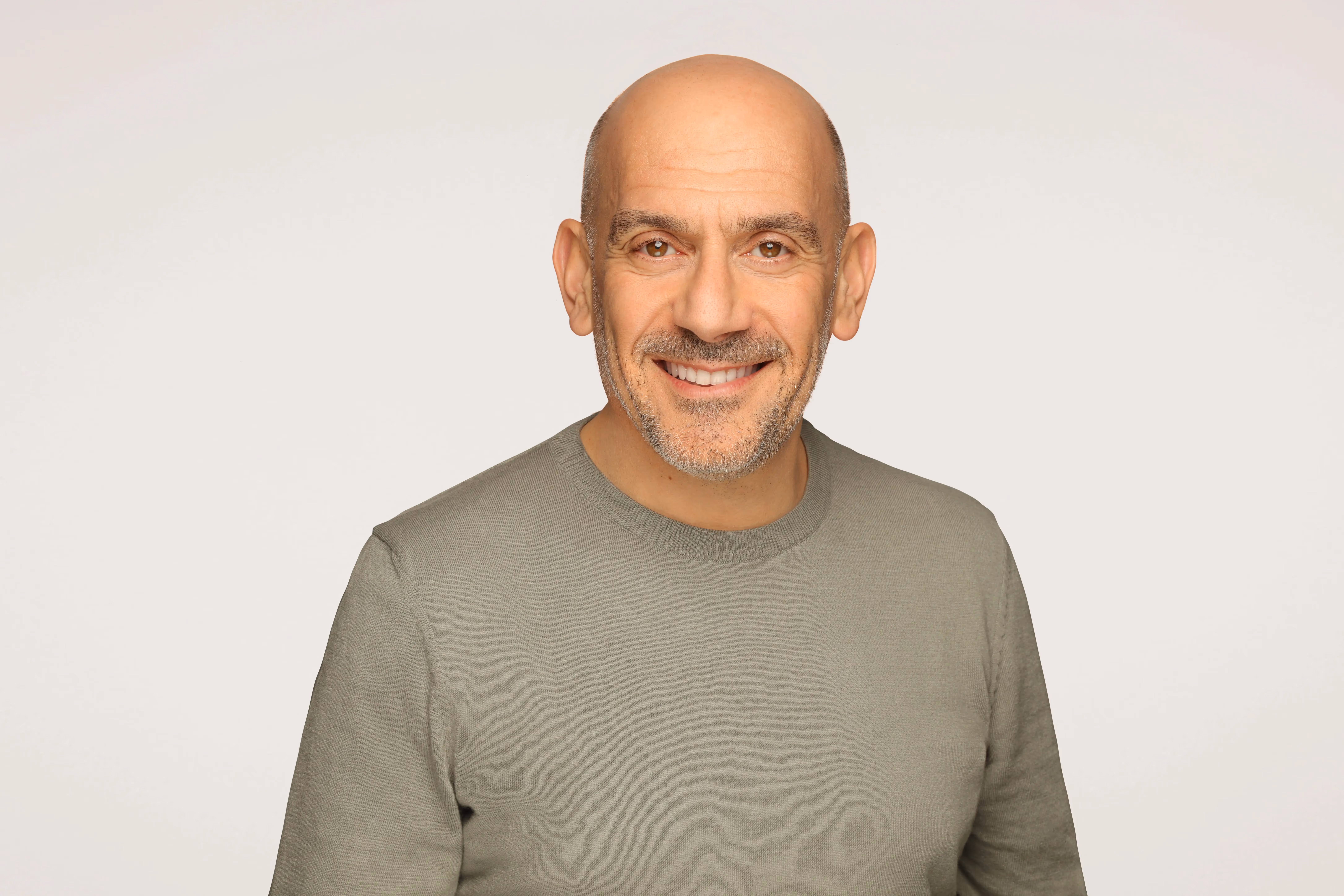 Man with green pullover