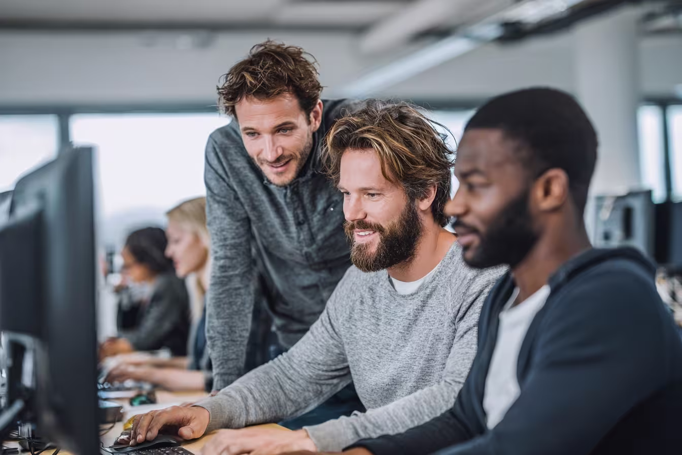 IT specialist assisting small business team