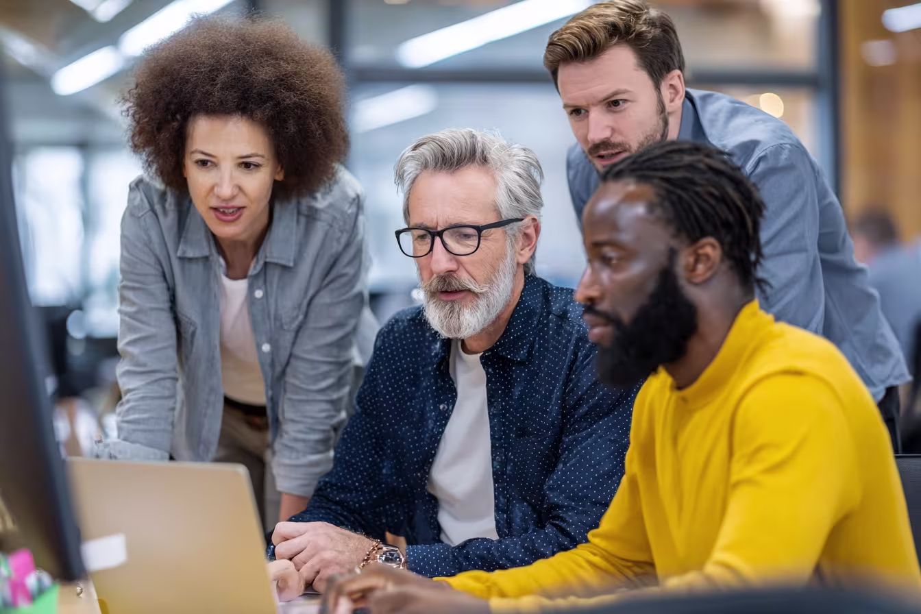 Diverse professionals discussing IT cost optimization