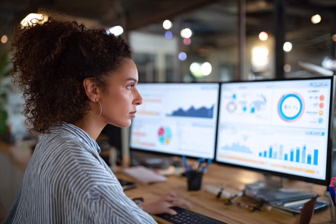 Businesswoman analyzing IT risk management dashboard