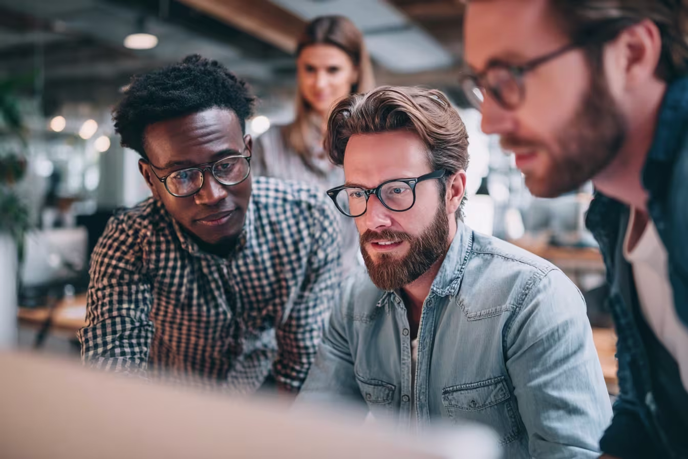 Diverse team discussing IT risk management